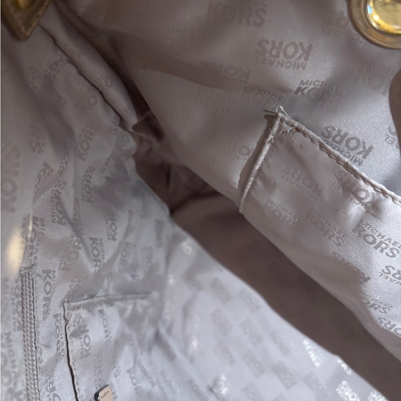 Michael Kors Women's Gold Metallic XL Tote Bag .
16” W x 11” T x 6.5” D - Picture 14 of 16